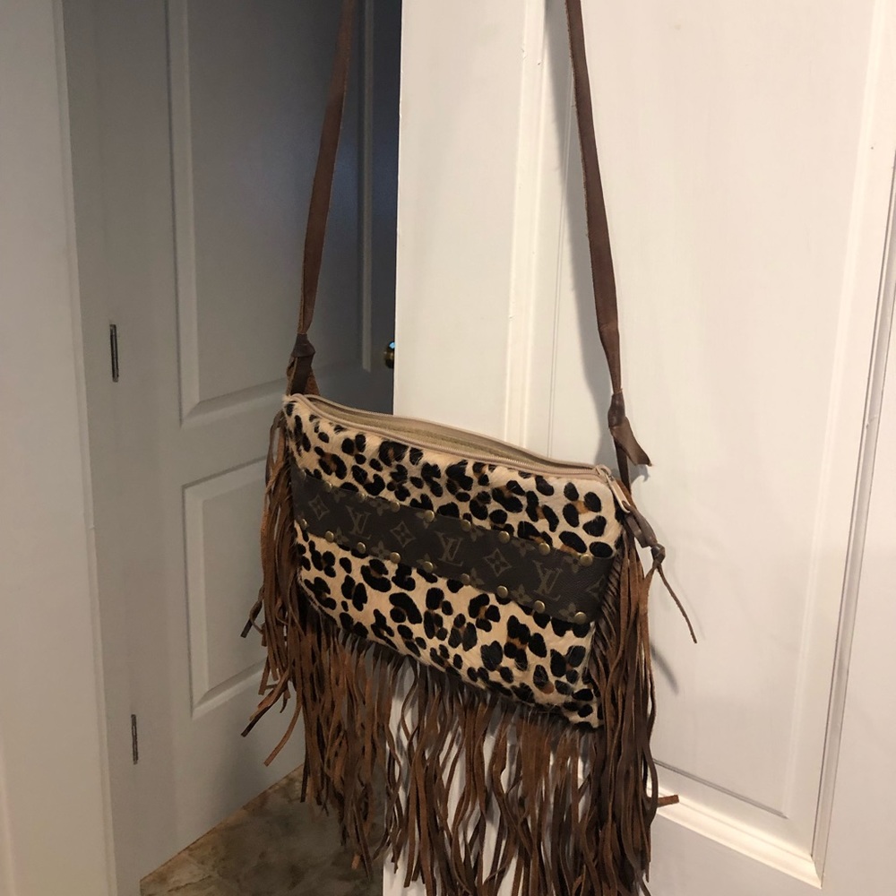 Louis Vuitton patch crossbody/ hide hair/fringe
